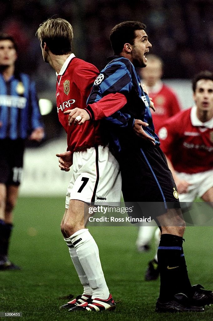 David Beckham of Manchester United and Ze Elias of Inter Milan