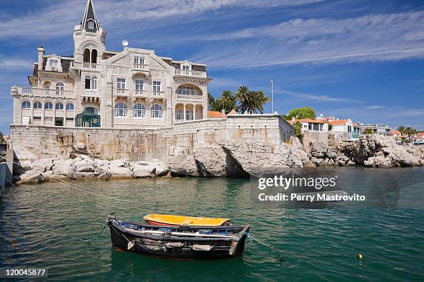 ministry of defense building and moored dinghies - cascais stock pictures, royalty-free photos & images
