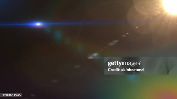 lentille flare, space light, sun light, abstract black background - lighting photos et images de collection
