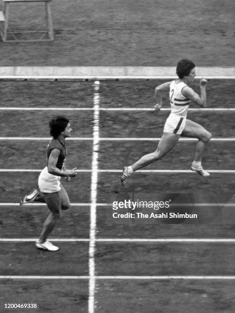 Dorothy Hyman of Great Britain and Galina Popova of Soviet Union compete in the Athletics Women's 100m during the Tokyo International Sports...