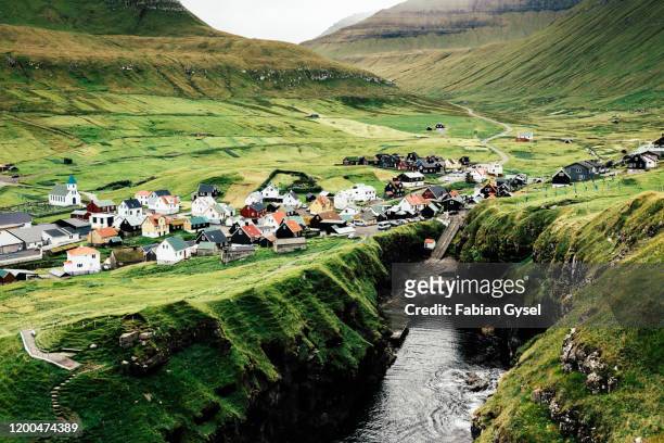 typical village in the faroe islands - faroe islands stock pictures, royalty-free photos & images