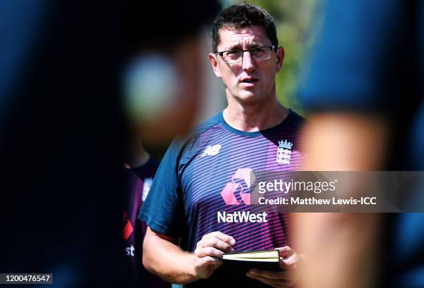 Jon Lewis, Head Coach of England talks to his players during the England nets session at De Beers Diamond Oval on January 19, 2020 in Kimberley,...