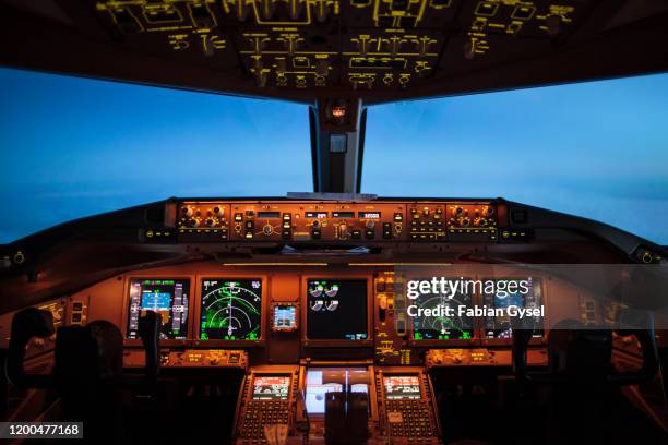 cockpit overview during the blue hour - airplane lights stock pictures, royalty-free photos & images