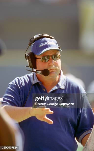 Head coach Mike Holmgren of the Seattle Seahawks looks on from the sideline during a game against the Pittsburgh Steelers at Three Rivers Stadium on...