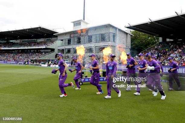 Hobart Hurricanes take the field during the Big Bash League match between the Hobart Hurricanes and the Adelaide Strikers at the University of...