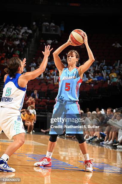 Shalee Lehning of the Atlanta Dream controls the ball against Leilani Mitchell of the New York Liberty on July 13, 2011 at the Prudential Center in...