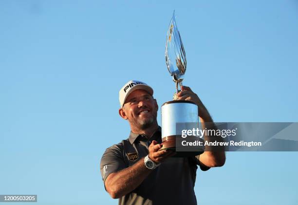 Lee Westwood of England lifts the trophy after winning the Abu Dhabi HSBC Championship following his final round on Day Four of the Abu Dhabi HSBC...