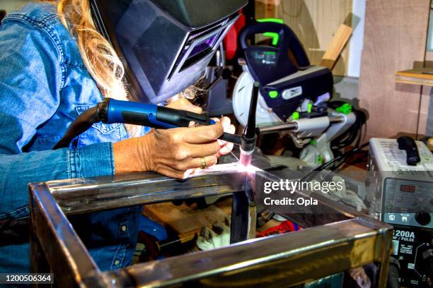 female tig welder - argon stock pictures, royalty-free photos & images