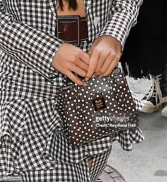 Mariya Nishiuchi, bag detail, seen at a Michael Kors Collection show on February 12, 2020 in New York City.