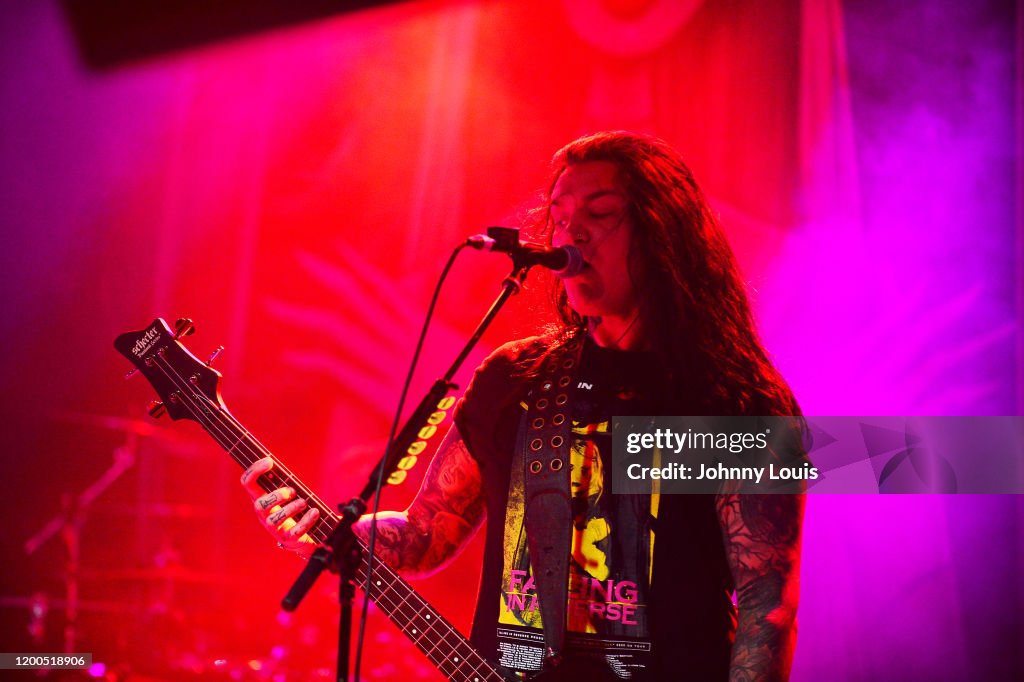 Tyler Falling In Reverse Bassist Tyler Burgess of Falling In Reverse performs during 'The Drug ...