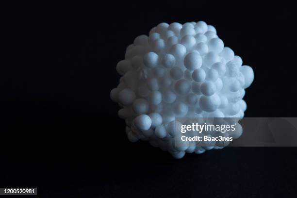 smal polystyrene balls connected to each other - styrofoam stockfoto's en -beelden