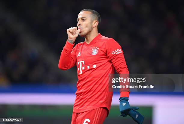 Thiago Alcántara of FC Bayern Muenchen celebrates after scoring his sides third goal during the Bundesliga match between Hertha BSC and FC Bayern...