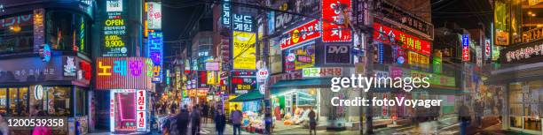 seoul neon nightlife crowds in colorful shopping streets panorama korea - namsan seoul stock pictures, royalty-free photos & images