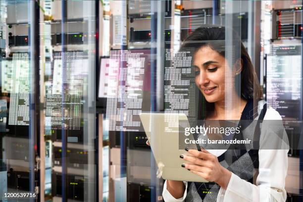 People Working Data Center Photos and Premium High Res Pictures - Getty ...