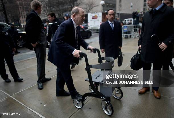 Harvey Weinstein arrives at the Manhattan Criminal Court, on February 13, 2020 in New York City. - Weinstein faces life imprisonment if convicted of...