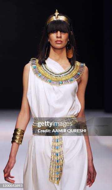 Pakistani model presents creation by Pakistani designer Shafaq Habib during first day of Islamabad Fashion Week in Islamabad on January 27, 2011....