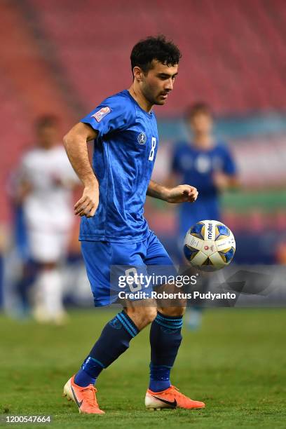 Nurillo Tukhtasinov of Uzbekistan in action during the AFC U-23 Championship quarter final match between UAE and Uzbekistan at Rajamangala National...