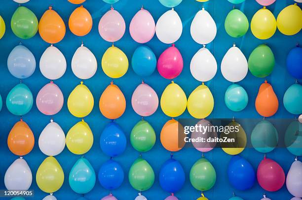 balloon darts game - games fair stock pictures, royalty-free photos & images