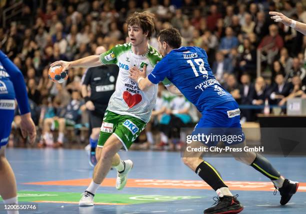 Jacob Tandrup Holm of the Fuechse Berlin and Ilyes Ferenc of Tatabanya KC during the EHF Cup match between Fuechse Berlin and Tatabanya KC at...