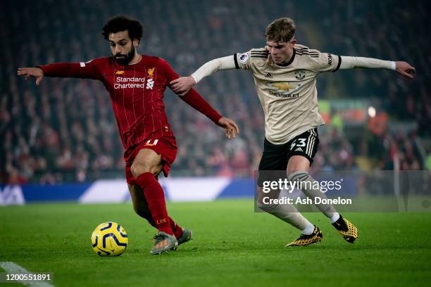 Brandon Williams of Manchester United in action with Mohamed Salah of Liverpool during the Premier League match between Liverpool FC and Manchester...