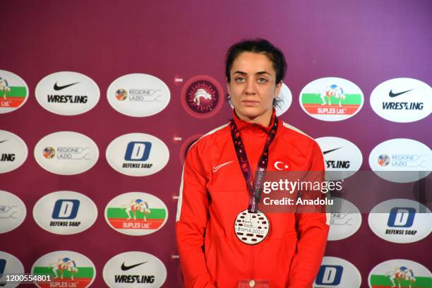 Bronze medalist Bediha Gun of Turkey poses for a photo during the medal ceremony after competing in Women's 55kg wrestling match during the fourth...