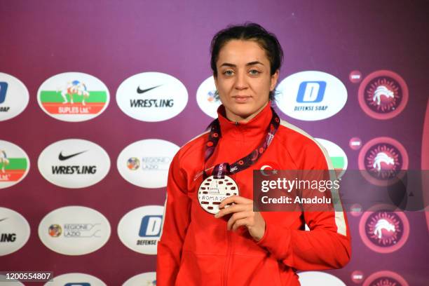 Bronze medalist Bediha Gun of Turkey poses for a photo during the medal ceremony after competing in Women's 55kg wrestling match during the fourth...