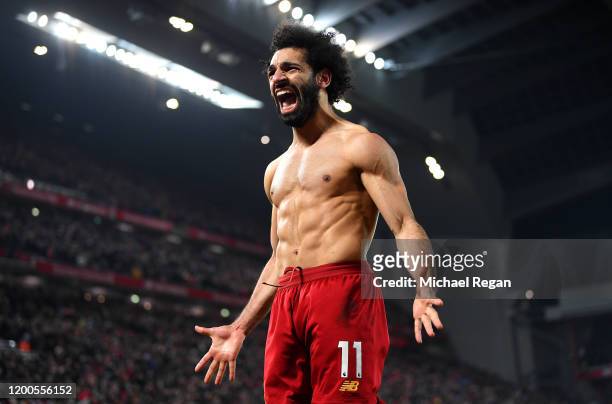 Mohamed Salah of Liverpool celebrates after scoring his team's second goal during the Premier League match between Liverpool FC and Manchester United...