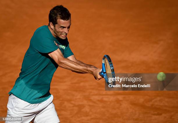 Albert Ramos Vinolas of Spain hits a backhand during his Men's Singles match against Pablo Cuevas of Uruguay during day 4 of ATP Buenos Aires...