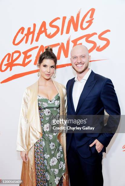 Amanda Cerny and Johannes Bartl attend Lewis Howes Documentary Live Premiere: Chasing Greatness at Pacific Theatres at The Grove on February 12, 2020...