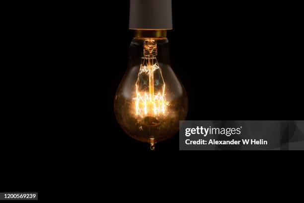 vintage lightbulb - light bulb stock pictures, royalty-free photos & images