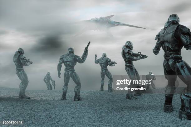 futuristic cyborg army squad with approaching spaceship - space war stock pictures, royalty-free photos & images