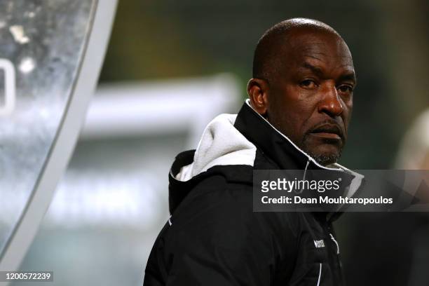 Den Haag assistant manager / assistant coach, Chris Powell gives his players instructions from the sidelines or bench during the Eredivisie match...