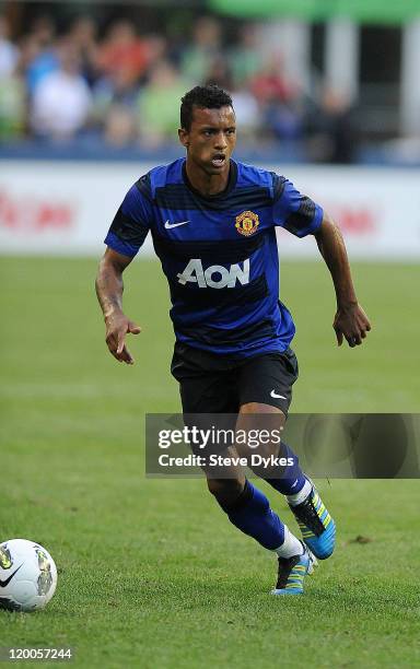 Nani of Manchester United brings the ball up the field against the Seattle Sounders FC during the second half of the game at CenturyLink Field on...