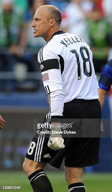 Goal keeper Casey Keller of the Seattle Sounders FC yells out to his teammates during the first half of the game against of Manchester United at...