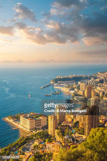 high angle view of monaco cityscape at sunrise - monte carlo aerial stock pictures, royalty-free photos & images