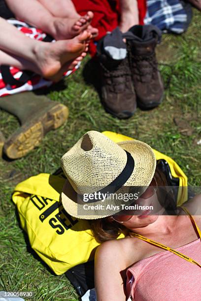 festival goer at glastonbury festival 2011 - music festival grass stock pictures, royalty-free photos & images