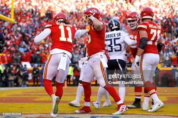 Patrick Mahomes of the Kansas City Chiefs reacts after running for a 27 yard touchdown in the second quarter against the Tennessee Titans in the AFC...