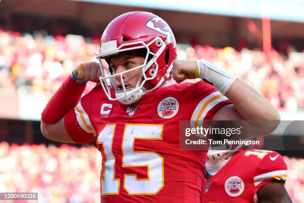 Patrick Mahomes of the Kansas City Chiefs reacts after running for a 27 yard touchdown in the second quarter against the Tennessee Titans in the AFC...