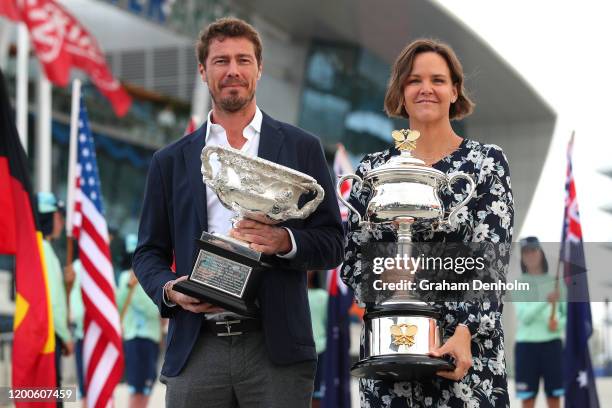 Former tennis players Marat Safin and Lindsay Davenport pose with the Norman Brookes Challenge Cup and the Daphne Akhurst Memorial Cup at the...