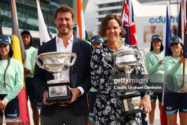 Former tennis players Marat Safin and Lindsay Davenport pose with the Norman Brookes Challenge Cup and the Daphne Akhurst Memorial Cup at the...