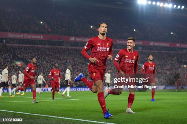 Virgil van Dijk of Liverpool celebrates scoring to make it 1-0 during the Premier League match between Liverpool FC and Manchester United at Anfield...