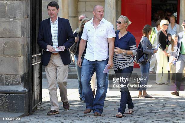 Tim Laurence, father of the bride, Mike Tindall and his fiancee Zara Phillips leave Canongate Kirk after a wedding rehearsal on July 29, 2011 in...