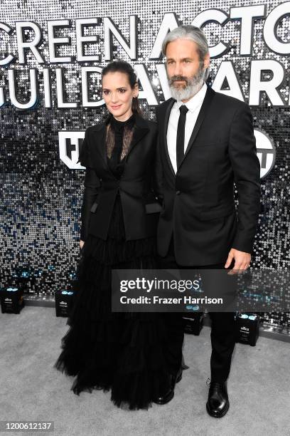 Winona Ryder and Scott Mackinlay Hahn attend the 26th Annual Screen Actors Guild Awards at The Shrine Auditorium on January 19, 2020 in Los Angeles,...