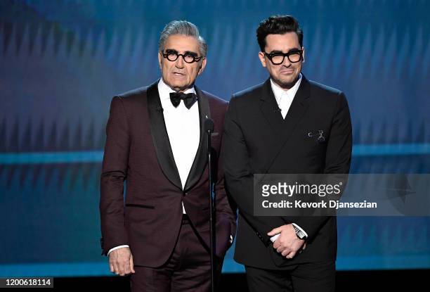 Eugene Levy and Dan Levy speak onstage at the 26th Annual Screen Actors Guild Awards at The Shrine Auditorium on January 19, 2020 in Los Angeles,...