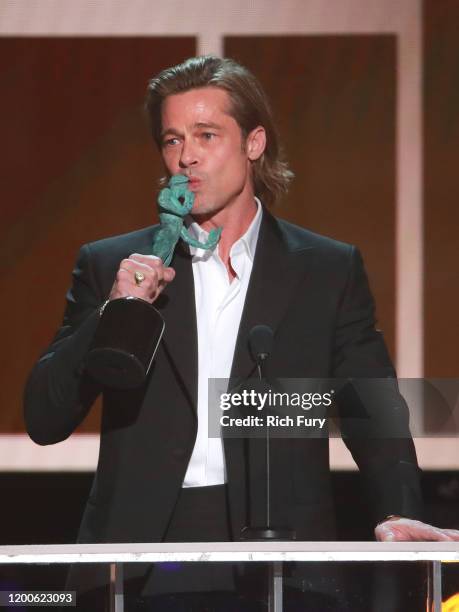 Brad Pitt accepts the awards for Outstanding Performance by a Male Actor in a Supporting Role for "Once Upon A Time In Hollywood" onstage during the...