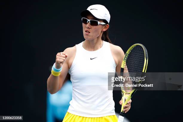 Saisai Zheng of China celebrates after winning a point during her Women's Singles first round match against Anna Kalinskaya of Russia on day one of...