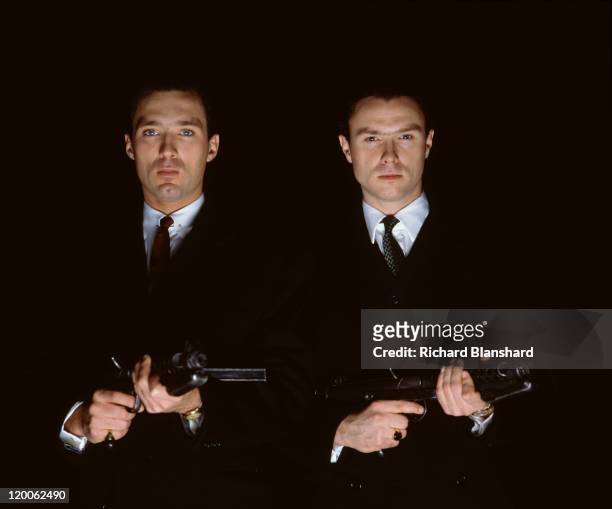 English actors, singers and brothers Martin Kemp and Gary Kemp star in the film 'The Krays', 1990.