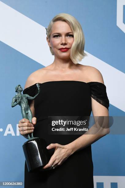 Michelle Williams poses in the press room after winning the award for Outstanding Performance by a Female Actor in a Television Movie or Limited...