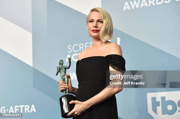 Michelle Williams poses in the press room after winning the award for Outstanding Performance by a Female Actor in a Television Movie or Limited...