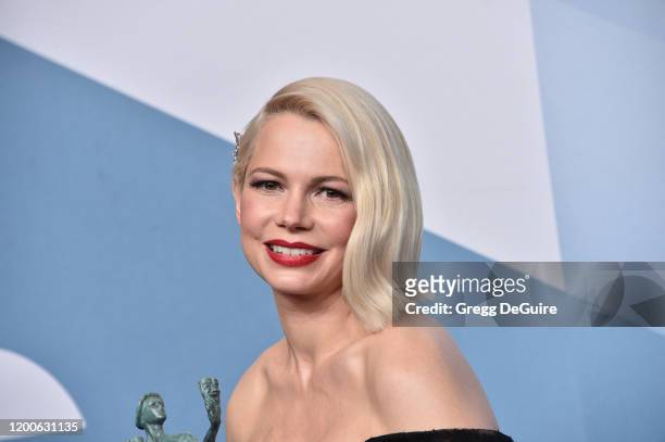 Michelle Williams, winner of Outstanding Performance by a Female Actor in a Television Movie or Miniseries for 'Fosse/Verdon', poses in the press...